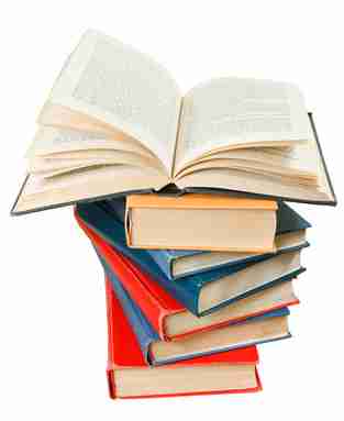 open book on top of stack of books