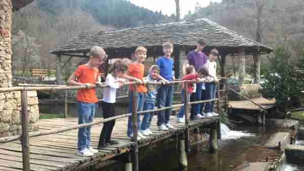 albania farma sotira children on bridge