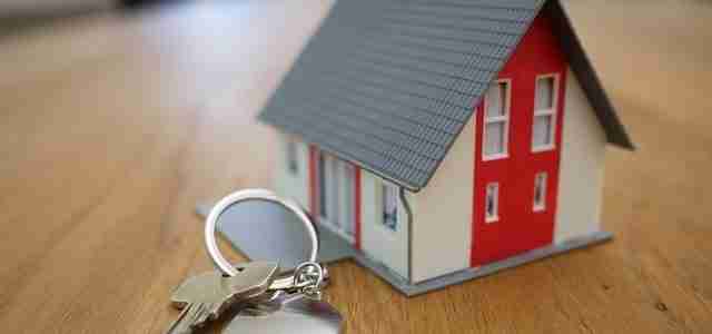 model house and door key