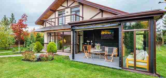 large house with open plan space opening out to garden