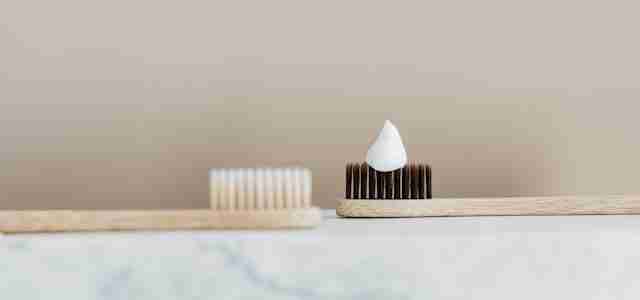 toothpaste on toothbrush
