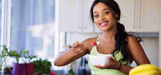woman eating healthy superfood