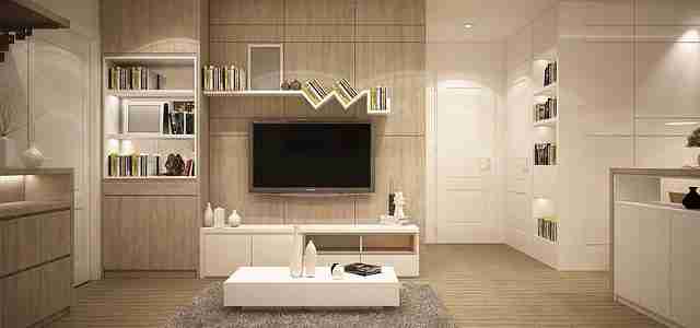 living room with media centre wall