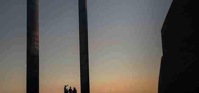 family on holiday in sunset