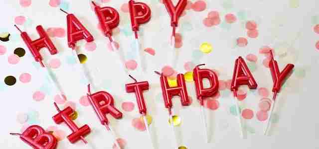 happy birthday candle flatlay display birthday parties for large families