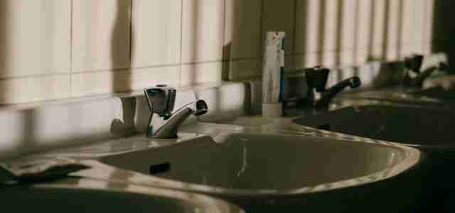 sink repair row of sinks