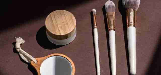 anti aging cellular longevity cream with mirror and cosmetic brushes
